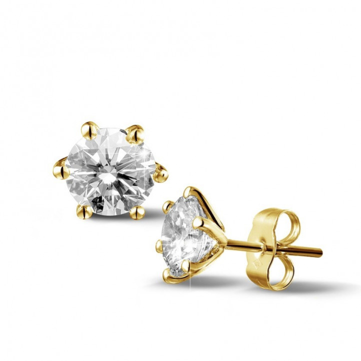 2.50 carat classic diamond earrings in yellow gold with six prongs