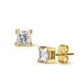1.00 carat diamond princess earrings in yellow gold
