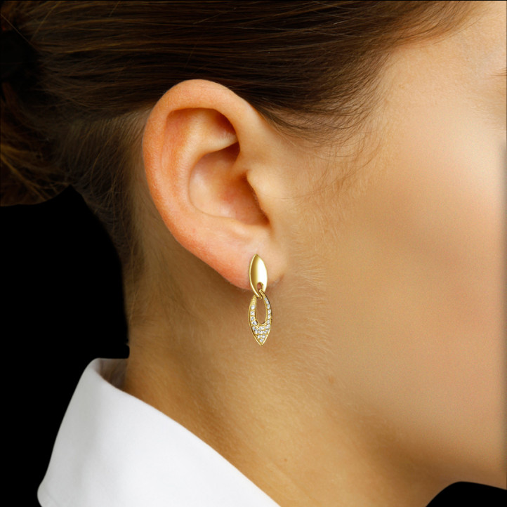 0.27 carat fine diamond earrings in yellow gold