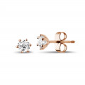 0.60 carat classic diamond earrings in red gold with six prongs