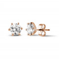 2.00 carat classic diamond earrings in red gold with six prongs