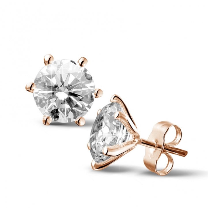 4.00 carat classic diamond earrings in red gold with six prongs