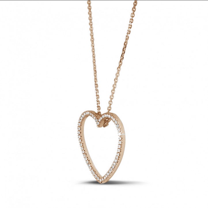 0.75 carat diamond heart shaped pendant in red gold
