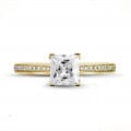 2.00 carat solitaire ring in yellow gold with princess diamond and side diamonds