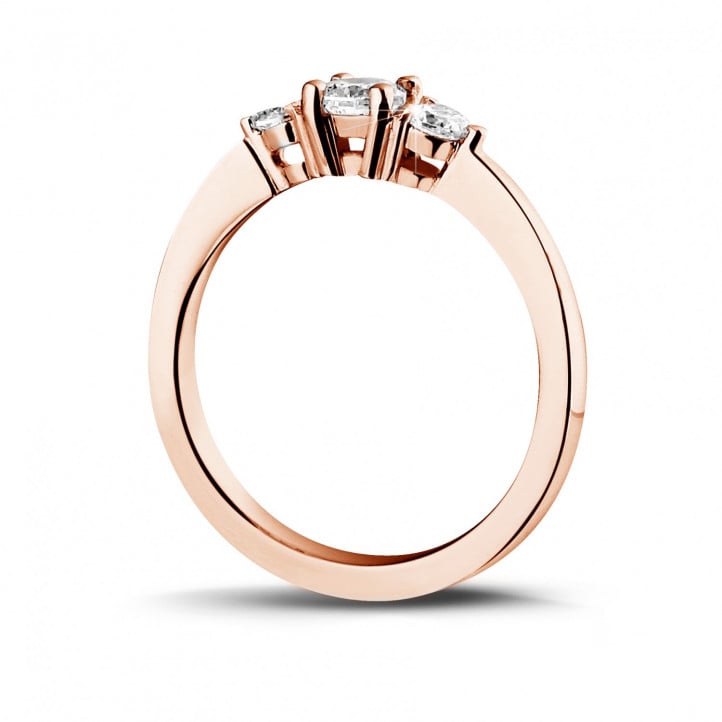 0.45 carat trilogy ring in red gold with round diamonds