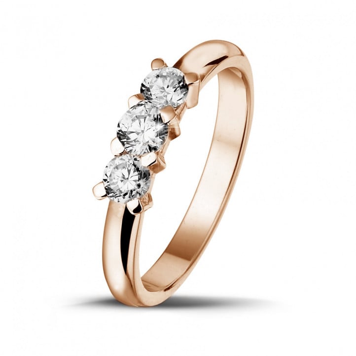 0.50 carat trilogy ring in red gold with round diamonds