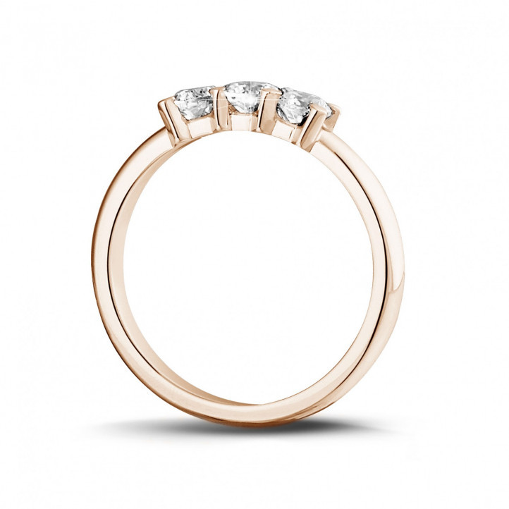 0.50 carat trilogy ring in red gold with round diamonds