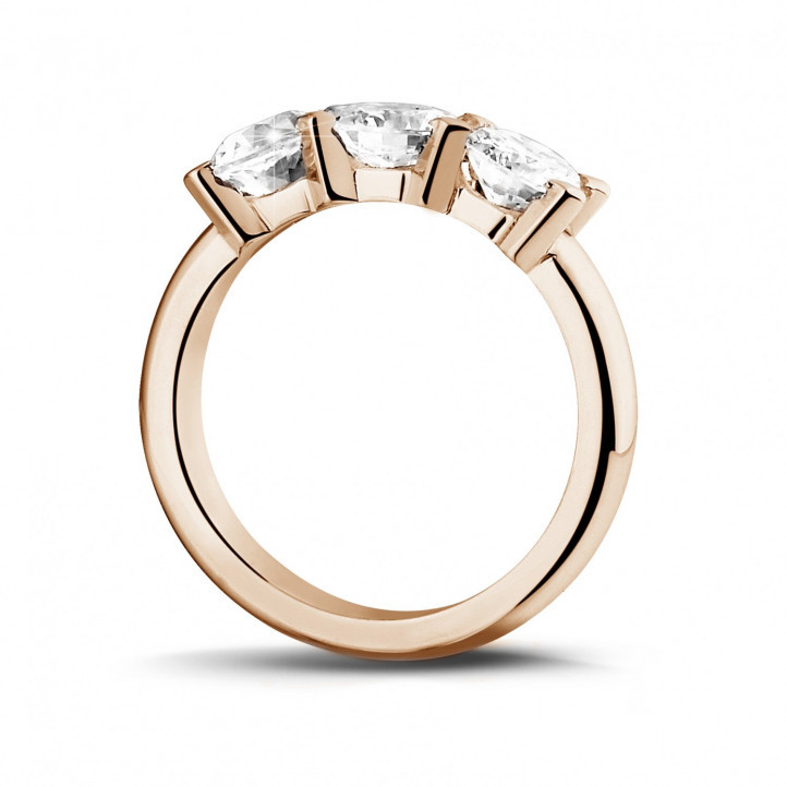 1.50 carat trilogy ring in red gold with round diamonds