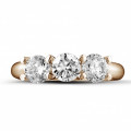 2.05 carat trilogy ring in red gold with round diamonds