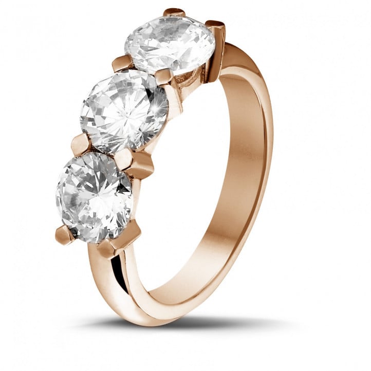 3.00 carat trilogy ring in red gold with round diamonds