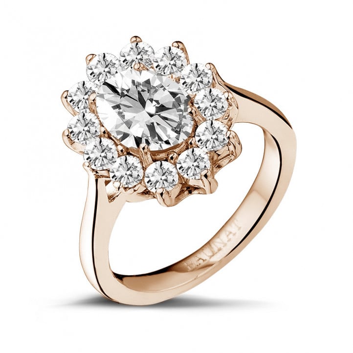 2.85 carat entourage ring in red gold with oval diamond