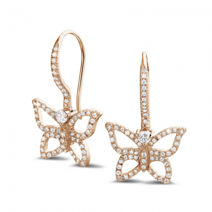 0.70 carat diamond butterfly designed earrings in red gold