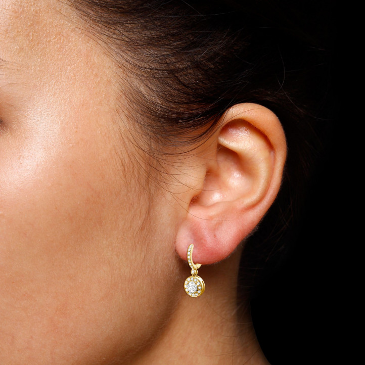 1.00 carat diamond halo earrings in yellow gold