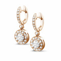 1.00 carat diamond halo earrings in red gold