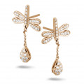 0.70 carat diamond dragonfly earrings in red gold