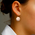 0.26 carat diamond design earrings in red gold