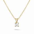 0.70 carat solitaire pendant in yellow gold with princess diamond