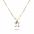0.70 carat solitaire pendant in red gold with princess diamond