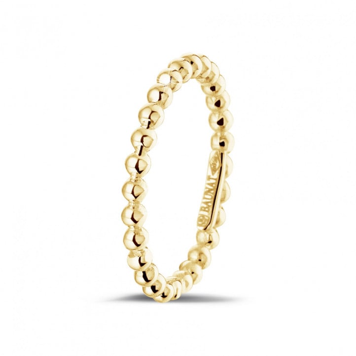 Stackable beaded ring in yellow gold