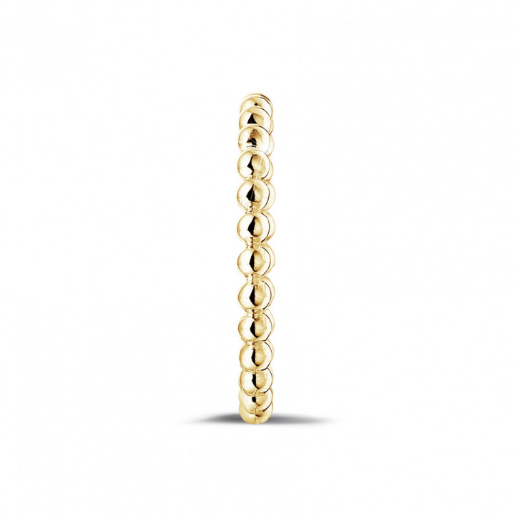Stackable beaded ring in yellow gold