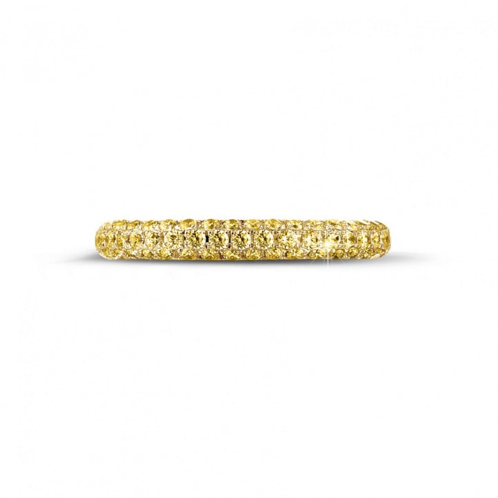 0.65 carat eternity ring (half set) in yellow gold with yellow diamonds
