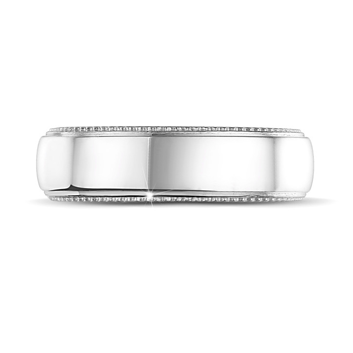 Wedding ring with a slightly domed surface of 6.00 mm in white gold with milgrain