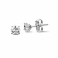 1.50 carat classic diamond earrings in white gold with four prongs