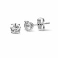 2.00 carat classic diamond earrings in white gold with four prongs