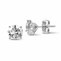 3.00 carat classic diamond earrings in platinum with four prongs