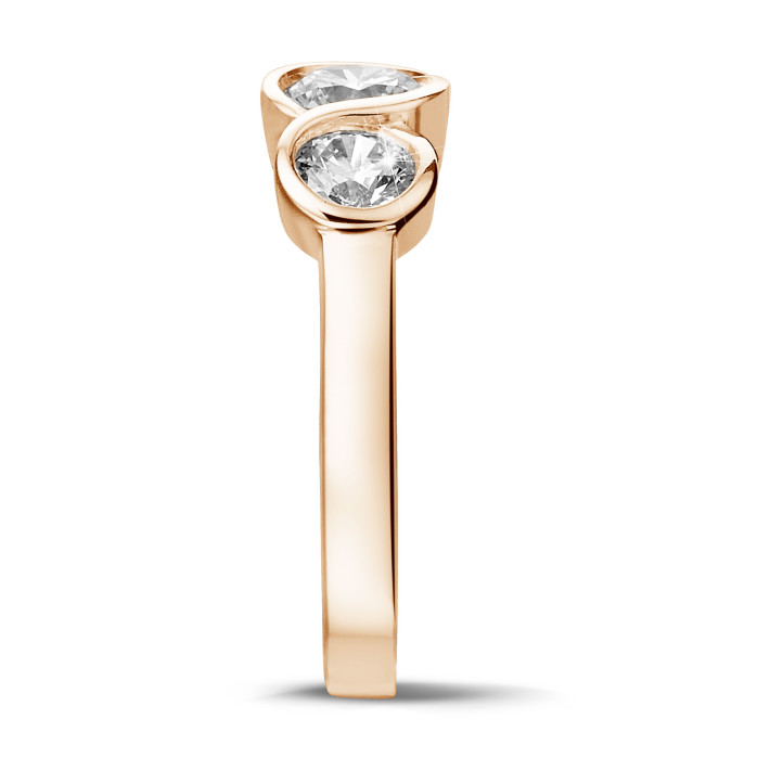 0.95 carat trilogy ring in red gold with round diamonds