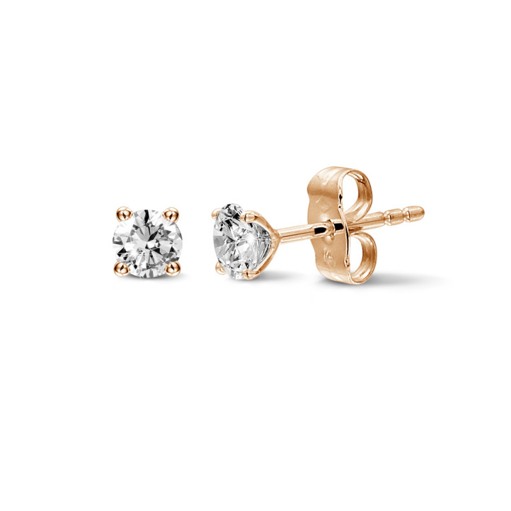 1.00 carat classic diamond earrings in red gold with four prongs