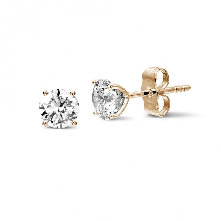 2.00 carat classic diamond earrings in red gold with four prongs