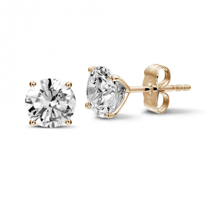 2.50 carat classic diamond earrings in red gold with four prongs