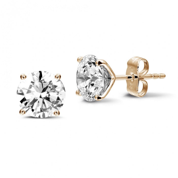 4.00 carat classic diamond earrings in red gold with four prongs