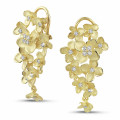 0.70 carat diamond design floral earrings in yellow gold