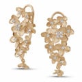 0.70 carat diamond design floral earrings in red gold