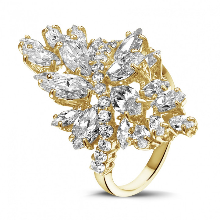 6.00 carat ring in yellow gold with marquise and round diamonds