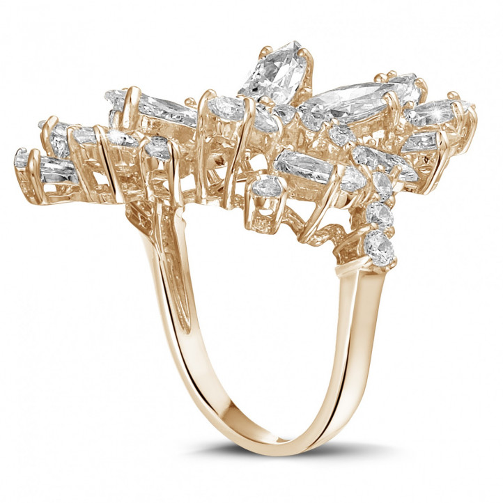 6.00 carat ring in red gold with marquise and round diamonds