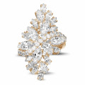 6.00 carat ring in red gold with marquise and round diamonds
