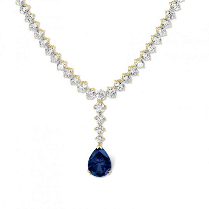 21.30 carat diamond gradient necklace in yellow gold with pear-shaped sapphire