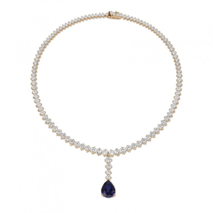 21.30 carat diamond gradient necklace in red gold with pear-shaped sapphire