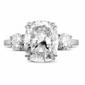 Ring in white gold with cushion diamond and round diamonds