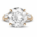 Ring in red gold white round diamond and taper cut diamonds