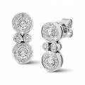 1.00 carat diamond earrings in white gold
