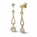 1.20 carat diamond earrings in yellow gold
