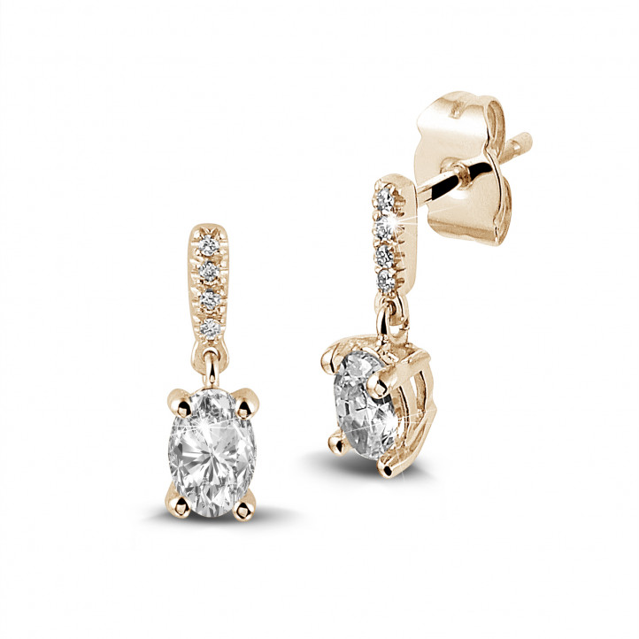 0.94 carat earrings in red gold with oval diamonds