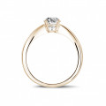 0.58 carat solitaire ring in red gold with oval diamond