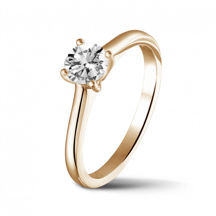 0.50 carat solitaire ring in red gold with round diamond and four prongs
