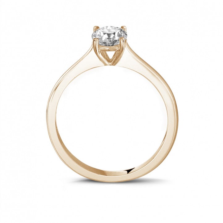 0.50 carat solitaire ring in red gold with round diamond and four prongs