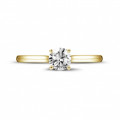 0.50 carat solitaire ring in yellow gold with round diamond and four prongs
